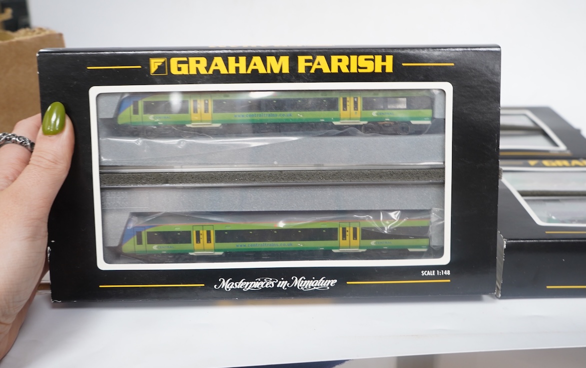 Three boxed Graham Farish N gauge railway DMU train packs; a South West Trains 170/4 2-car DMU (371-427), a Midland Mainline 170/1 Turbostar 2-car DMU (371-425), and a Central Trains Turbostar 170/5 2-car DMU (371-426).